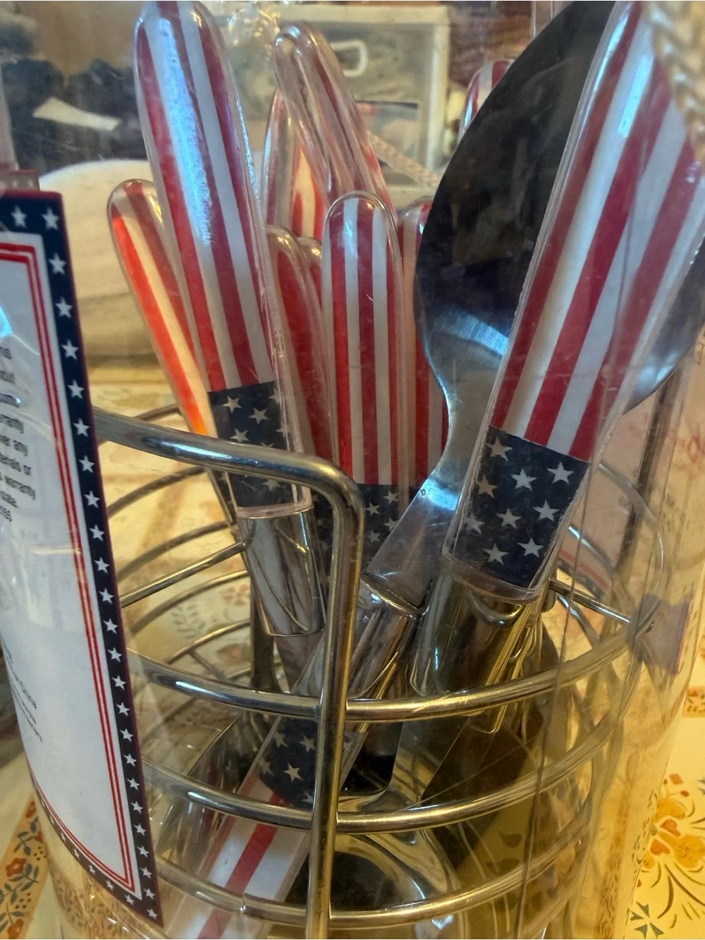 Two unopened packages of Pfaltzgraff Everyday Americana 16-piece flatware sets